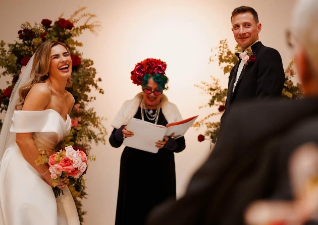 couple at the altar laughing, celebrant led wedding ceremony