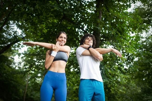 2 people stretching