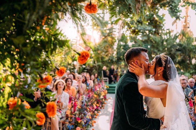 Roisin Quinn kissing new husband at the altar