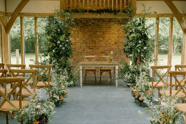 Ceremony area, aise and floral arch at the Oak Tree of Peover