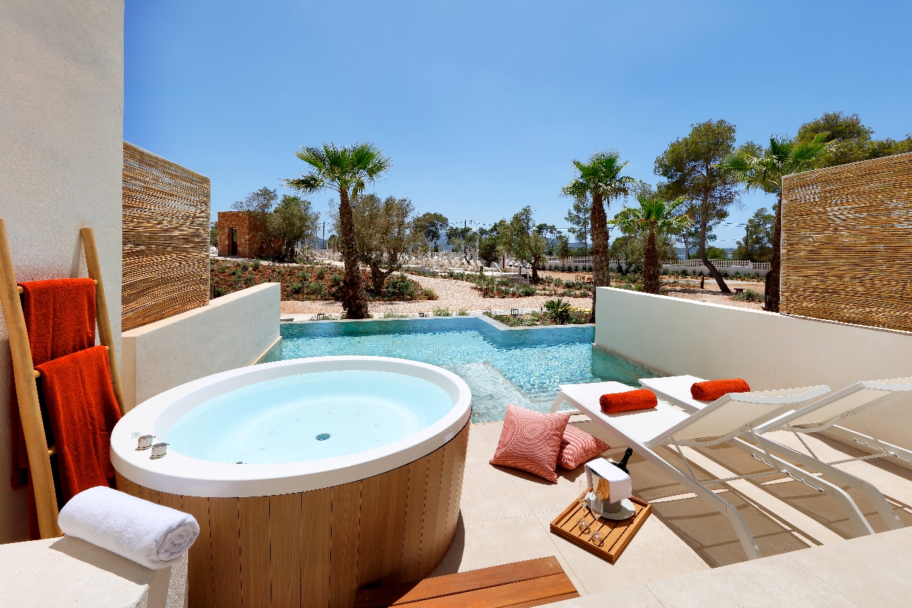 room terrace with pool and desert view